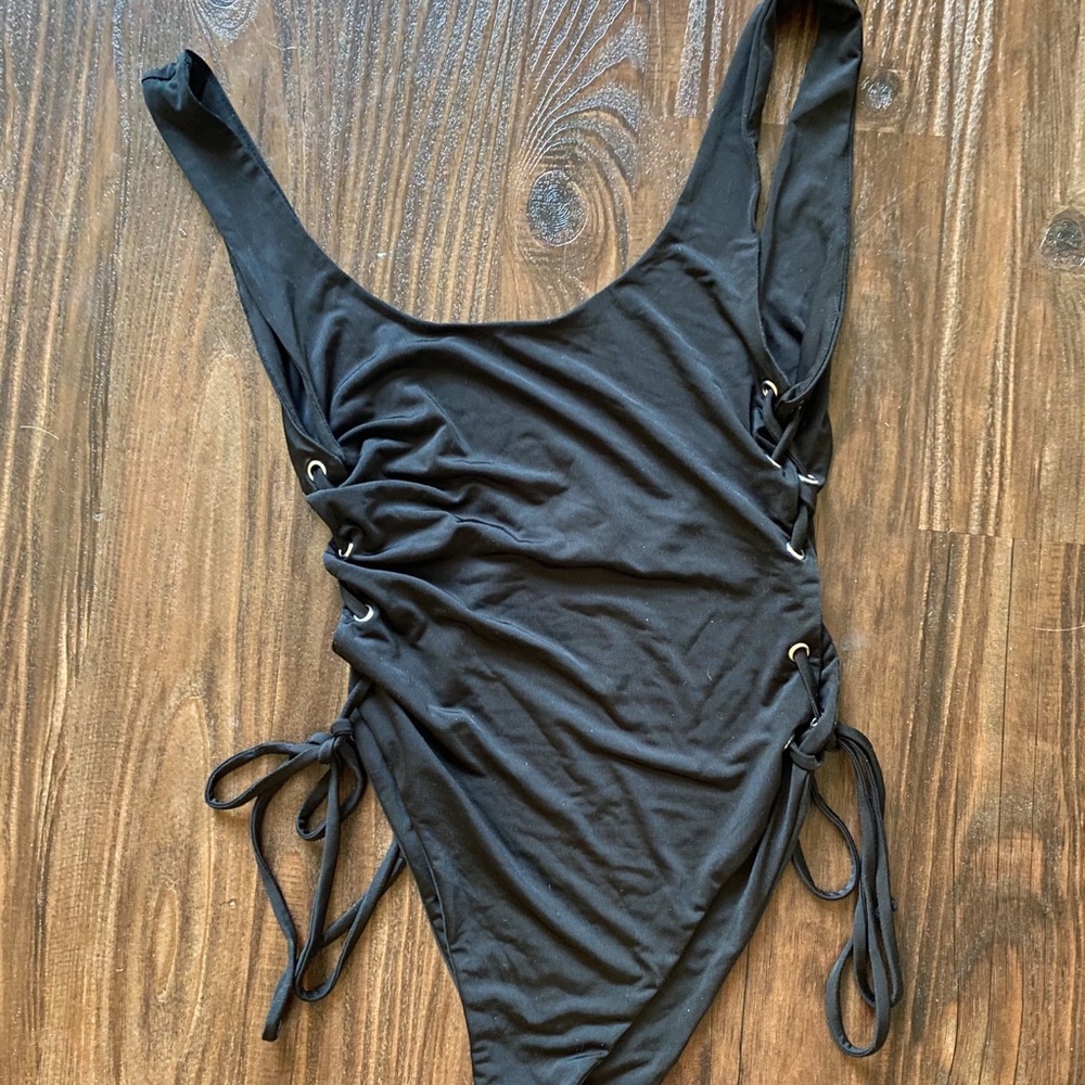 One piece black with side ties